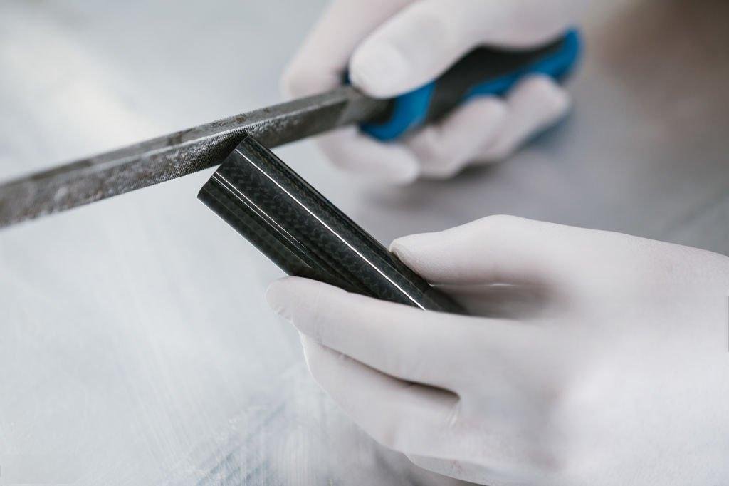 Grinding carbon fiber