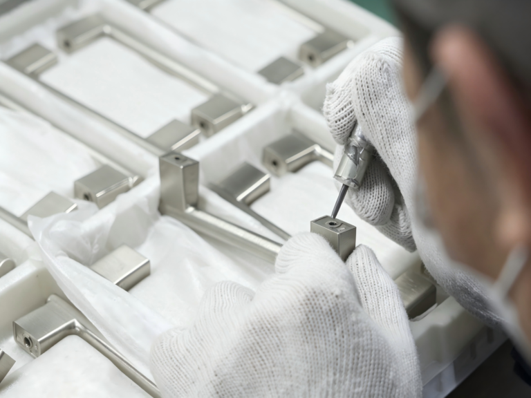 Manual dimensional inspection of a metal component, from the existing TOPS website image library